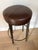 Elevate your space with this exceptional pair of custom-made bar stools attributed to the renowned luxury furniture maker...