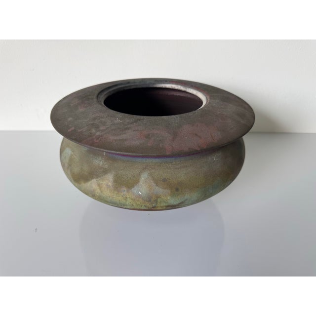Striking vintage raku studio pottery vase dating to the 1980s, featuring a sculptural, organic form with a wide flared rim...