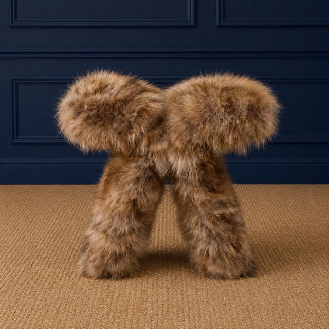 The Verellen Natural Raccoon Butterfly Stool is a striking blend of sculptural form and organic texture. Inspired by the...