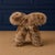 The Verellen Natural Raccoon Butterfly Stool is a striking blend of sculptural form and organic texture. Inspired by the...