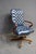 Leathercraft swivel office chair upholstered in deep blue tufted leather with button detailing on the back and seat....