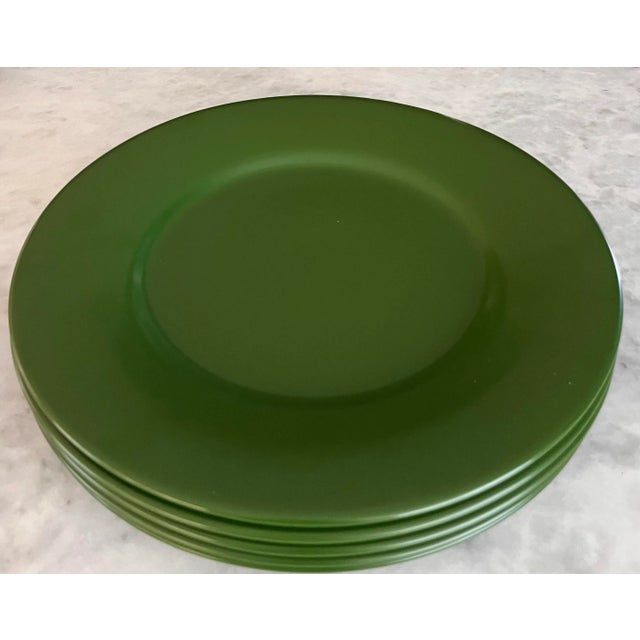 Set of 5 large ceramic charger plates in a lovely basil green color made by Gien France. Marked on the bottom.