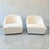 A pair of Lee Industries 5900-01SW swivel chairs, a current-production design distinguished by its clean, sculptural...