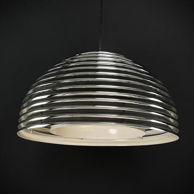 Kazuo motozawa saturno pendant light the "saturno" hanging lamp from staff leuchten is an impressive designer piece...