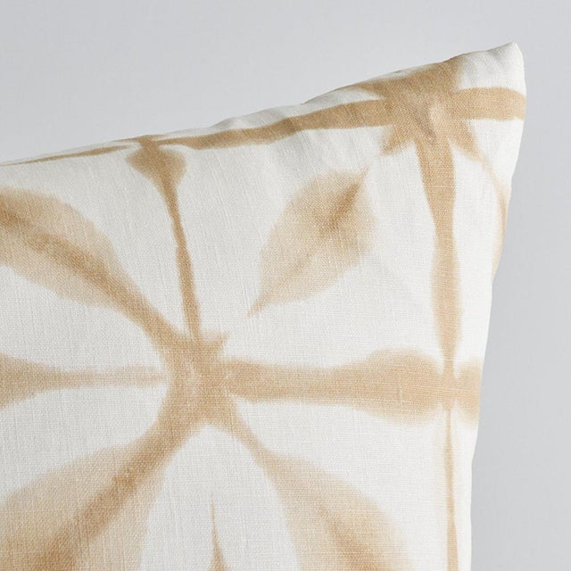 This pillow features Andromeda with a Knife Edge finish. This printed linen evokes the traditional Japanese dye technique...