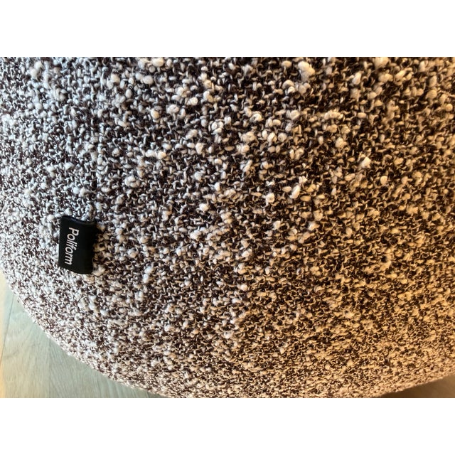 Saint-Germain is a sofa inspired by sensual shapes reminiscent of 1970s design. From the haute couture texture of bouclé...