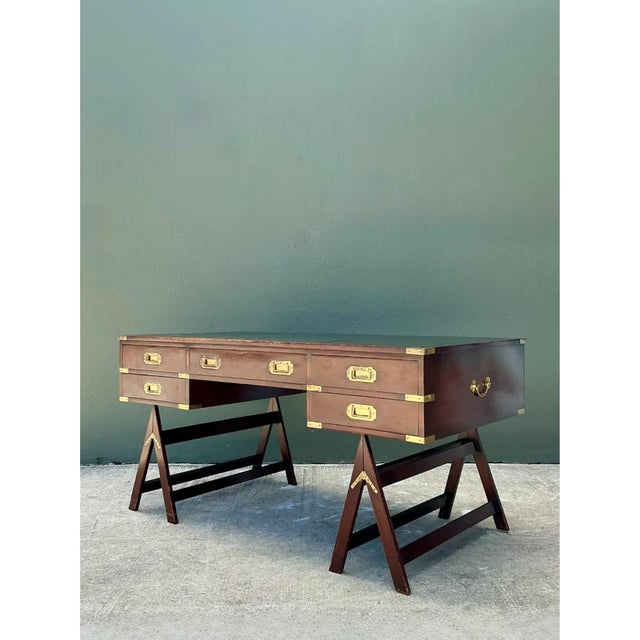 Crafted from richly grained mahogany, this 19th-century Victorian military campaign desk showcases the utilitarian...