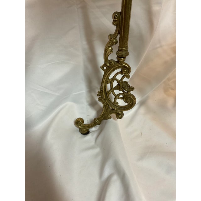 Beautiful.brass side table, plant stand, tea table works with any decor. Has birds decorating the shelves..