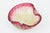 This vintage Italian 1960's Murano glass bowl has pinched sides. The top portion is pink with silver foil and gold foil...