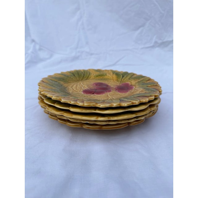 Early 20th Century Majolica embossed fruit plates will add a classic & fun touch to your tableware.
