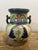 This magnificent two-handled vase is an authentic specimen of the "damascus" decor from plateelbakkerij zuid-holland...