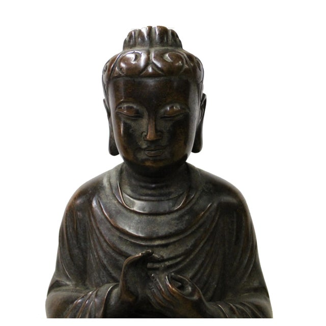 This is a nicely made bronze metal Buddha Statue with charm bronze brown metal color and precise body details. It is a...