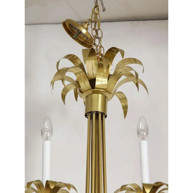 Stunning 1950s eight-arm large Italian solid brass flower chandelier. Newly restored and professionally rewired.