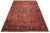 Offered is a vintage handmade wool Turkish Sparta rug with a floral design.