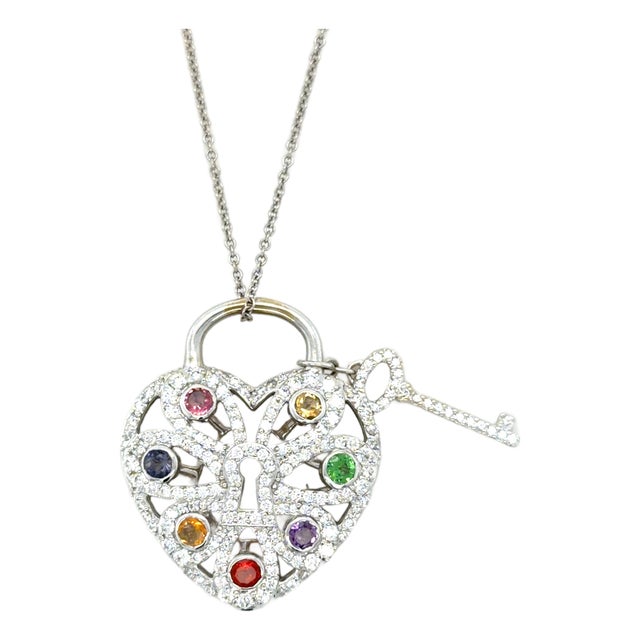 Tiffany & Co., Diamond and Multigem Heart Key Locket Pendant/Necklace For Sale