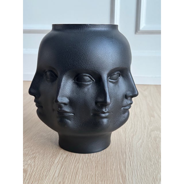 Rare and discontinued large size Fornasetti style perpetual face vase by The Museum Store (TMS) 2005. This piece, made of...