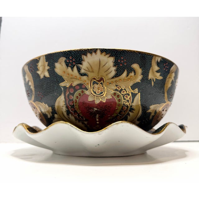 This Vintage Famille Noire Hand Painted Enamel Satsuma Ware Bowl & Scalloped Edge Plate from China features a Large...
