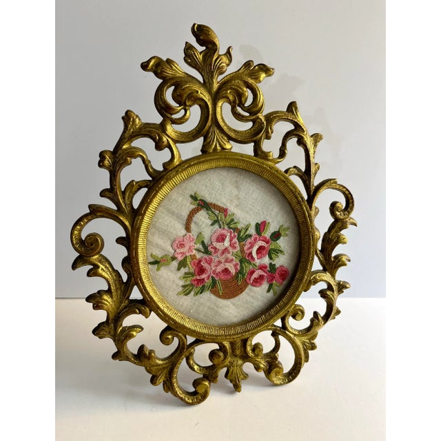 Vintage Italian Floral embroidery in highly decorative metal frame with self standing foot in back, folds flat. Lovely...