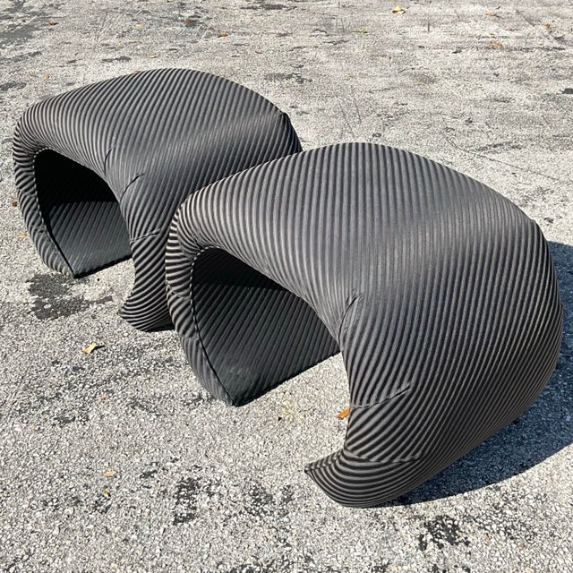 Add a touch of relaxed elegance to your space with these vintage boho waterfall ottomans. Featuring a sleek, curved...