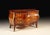 Handcrafted in Italy, this Bombay sideboard features a gracefully curved silhouette finished in richly figured walnut...