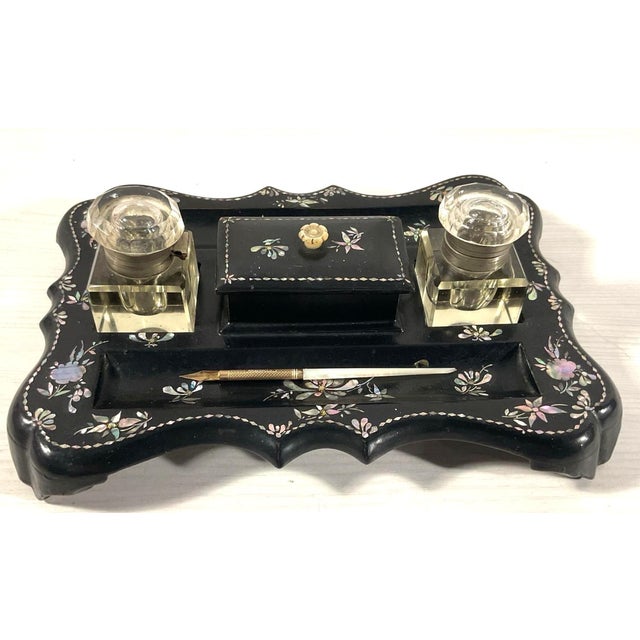 Presenting a spectacular and wonderfully complete 19th-century Victorian era papier-mâché double inkwell desk stand,...