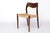 One chair from a set of four Model 71 chairs by Danish designer Niels Otto Møller, crafted in the rarer dark dyed oak...