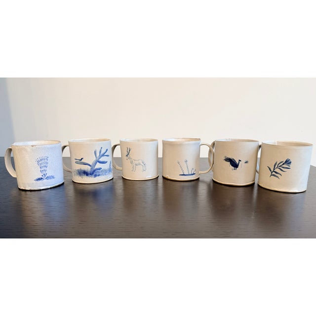 A rare opportunity to acquire a curated set of six one-of-a-kind ceramic mugs by Tyler Hays for BDDW. Handmade and...