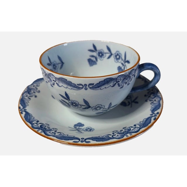 The Rorstrand Ostinda Sweden set of 8 cups and saucers features a charming floral pattern in a beautiful blue and white...