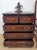This is a gorgeous antique styled chest of drawers that is sure to excentuate the home setting. The chest displays a rich...