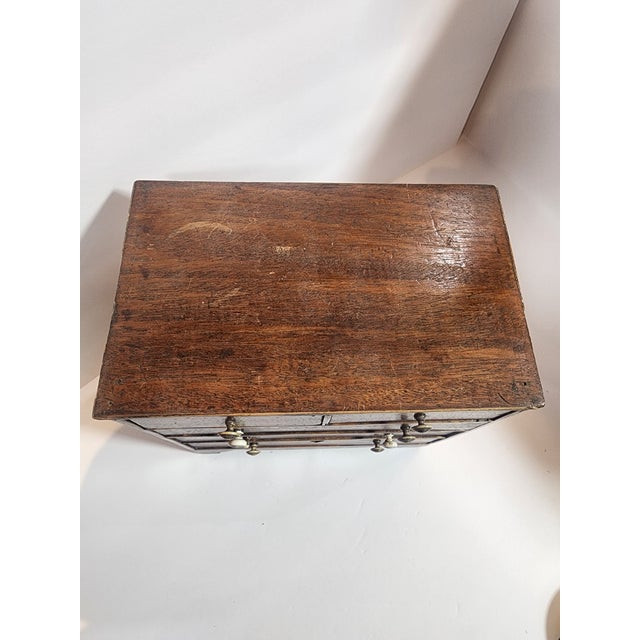 Though small this primitive dresser was used by traveling salesmen to show customers what they could purchase before...