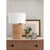 The Resort Bedside Table Lamp redefines style with its distinctive design featuring a bamboo-wrapped base, adding a unique...
