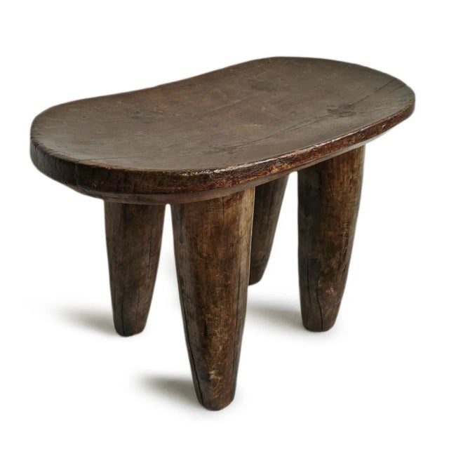Vintage Nupe tribal stool from Nigeria. Carved from one solid piece of indigenous wood. Beautiful patina with waxed finish.