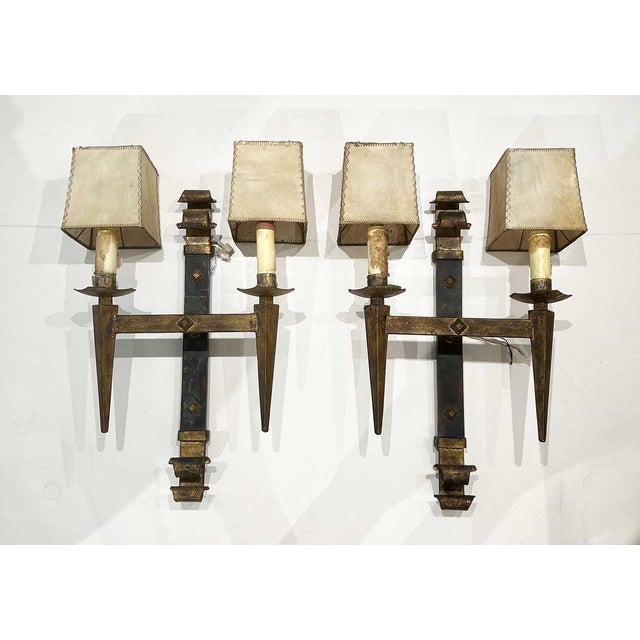 These exquisite Spanish wall sconces are a testament to the artistry and craftsmanship of traditional Spanish metalwork....