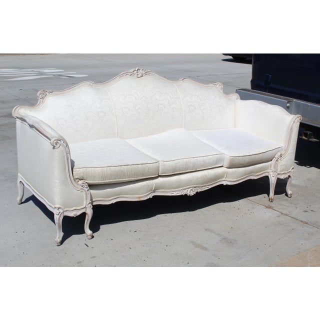 A lovely Louis XV style settee sofa. This French formal ,country ,shabby chic piece could easily be a formal traditional...