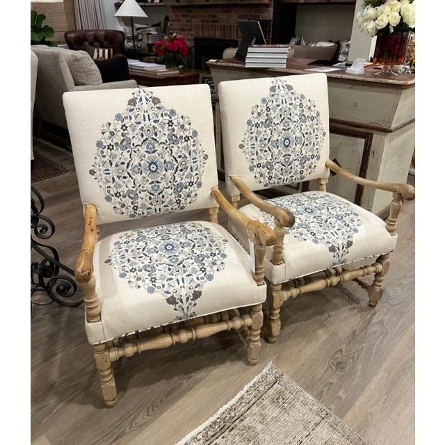 Antique 18th c open arm chairs bleached pine and re upholstered in block printed linen . Pair of antique open arm chairs .