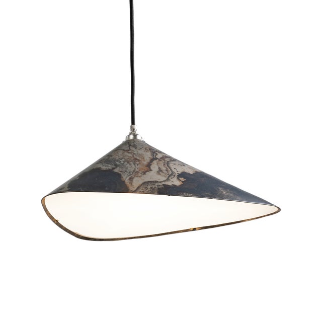 Emily is a series of handmade sheet steel lampshades in various finishes and spatial arrangements. _ Emily was inspired by...