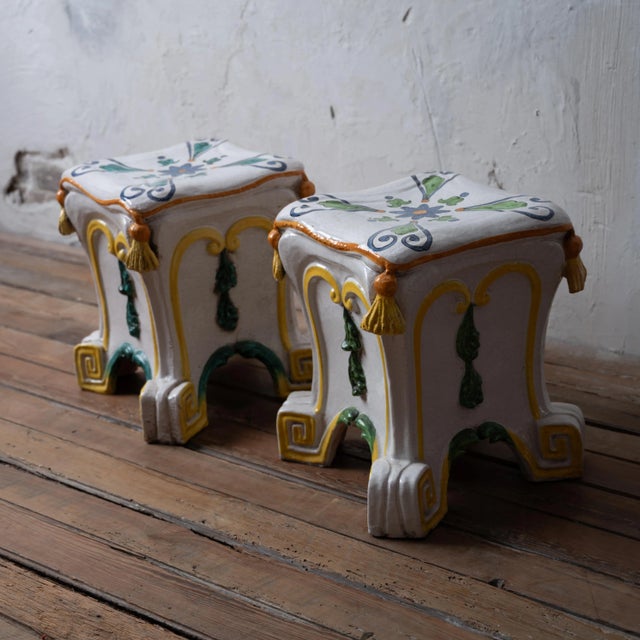 A pair of Italian majolica trompe l’oeil garden stools, mid-20th century. 13 inches wide by 13 inches deep by 15 ½ inches...