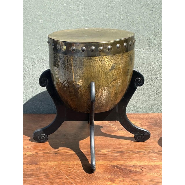 Showcasing timeless craftsmanship and global-inspired design, this vintage hammered brass drum table brings warmth,...