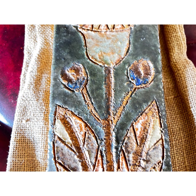 Stoneware plaque with floral decoration of the Argonauts, Vallauris, 1950, in perfect condition This piece has an...