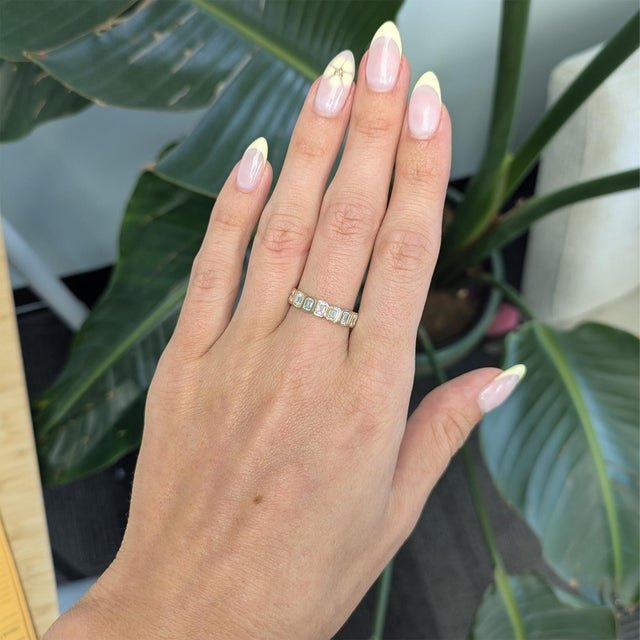 Elegant 1ct lab-grown diamond band ring set in solid 14K gold for timeless sparkle and everyday luxury. A refined wedding...