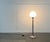 An impressive floor lamp by the italian manufacturer artemide, designed by anna fasolis and enzo mari in the 1960s. a...