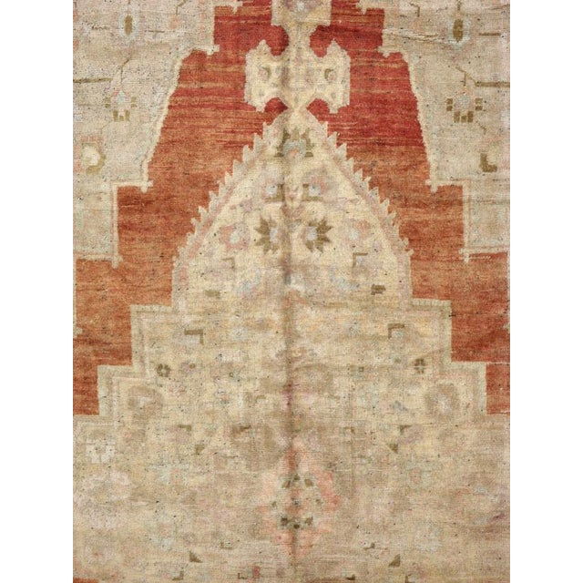 A vintage Turkish Oushak carpet from the mid-20th century. Measures: 6' 10" x 12' 7"