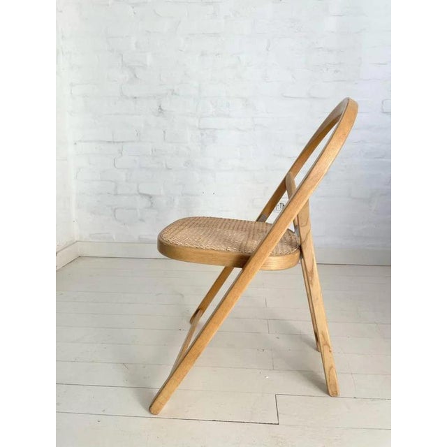 This original Italian folding chair, designed by Gigi Sabadin for Crassevig in the 1970s, is a true design classic. The...