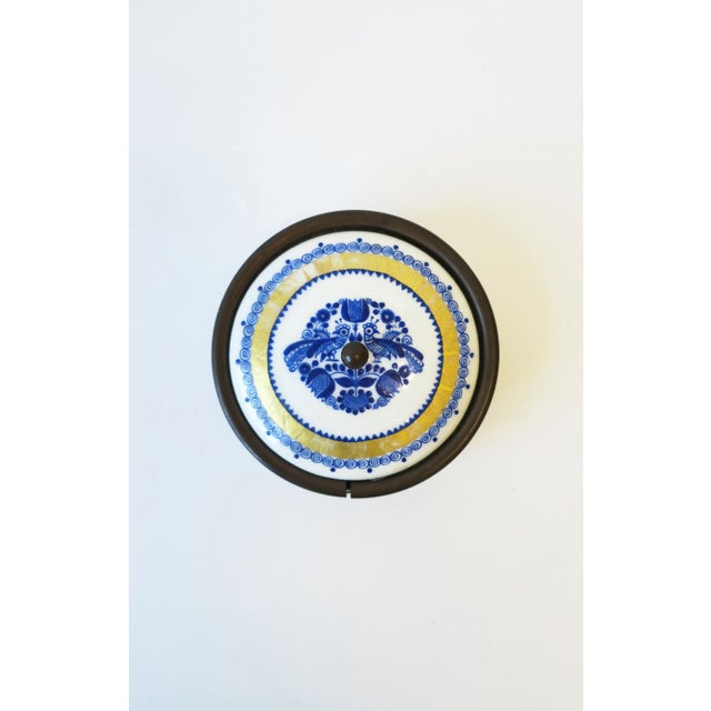 An Austrian blue, white, and gold porcelain enamel small box and lid by Black, Starr & Gorham, circa early-20th century,...