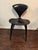 Why do these Cherner designed chairs say "Designed by Bernado?" In 1958, Norman Cherner was hired by Plycraft president...
