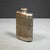 ABOUT An Art Deco brass plate over chrome caged metal hip flask with screw top lid and glass interior. Designed to be slim...