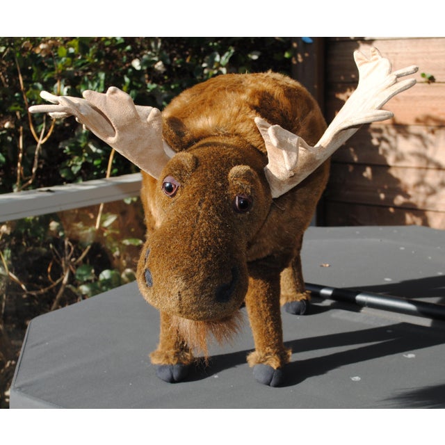 This Moose footstool is fun and functional, if you can bare to put your feet on him. He is plush with faux suede antlers,...