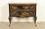 A gorgeous Hollywood Regency Chinoiserie commode or chest of drawers By Drexel Heritage USA, Circa 1970s Black lacquered...