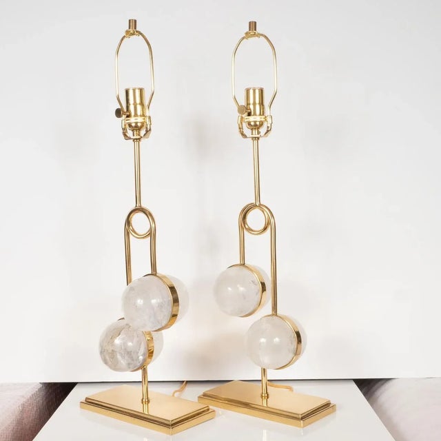 Pair of "Flux" table lamps composed of twisted, polished brass featuring inset polished Brazilian rock crystal. By Marcelo...