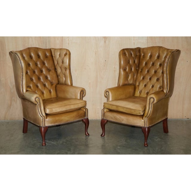 This is a very good looking and well-made suite, it has been upholstered with high grade premium cattle hide leather which...
